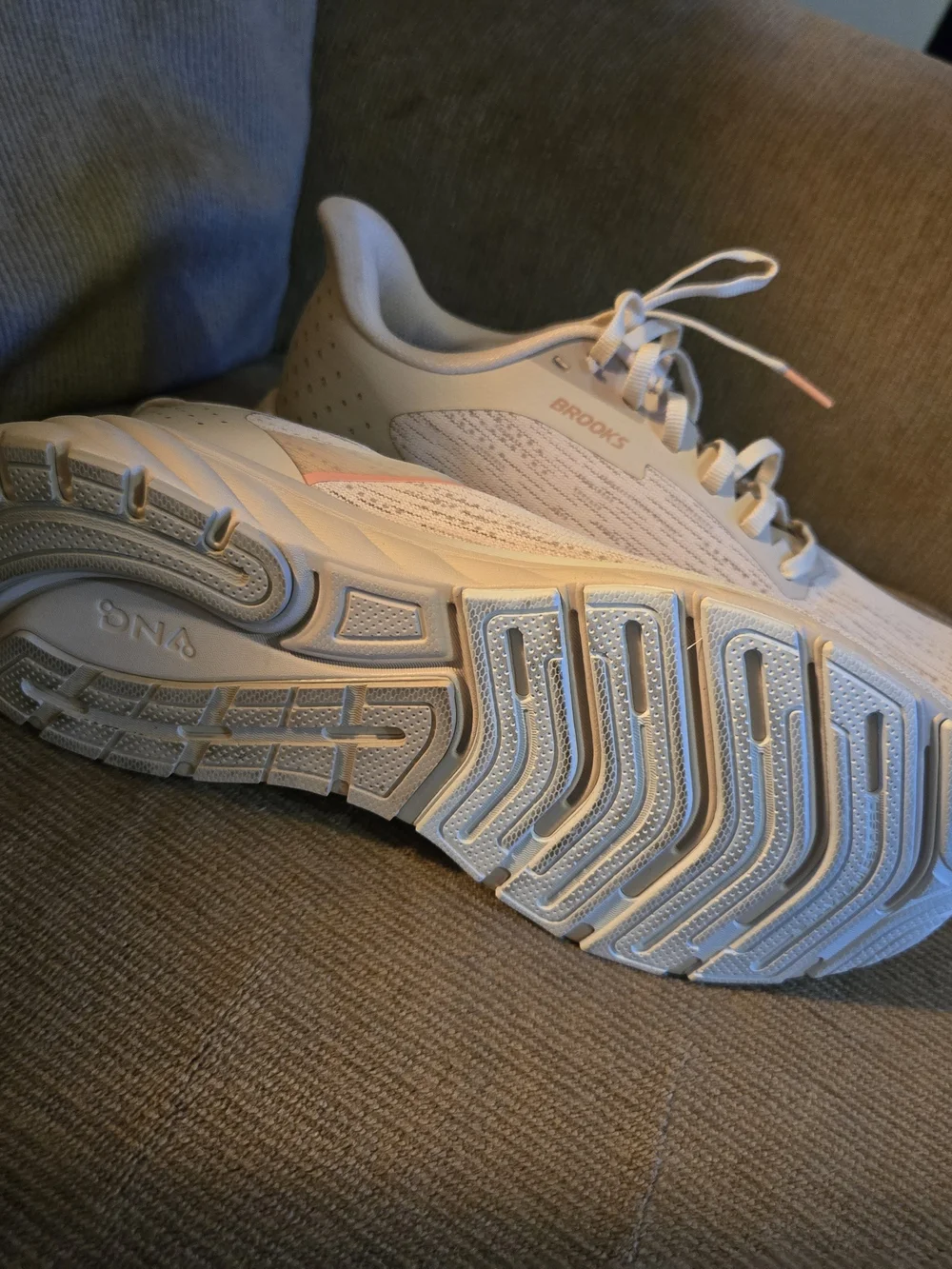 Brooks Woman Running Sneakers in Cream with Peach Accents